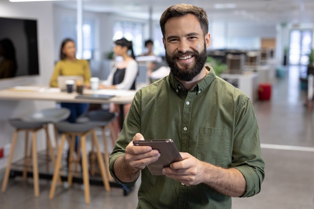 Portrait of smiling bearded businessman