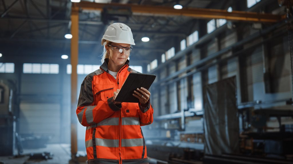 Professional Heavy Industry Engineer Worker Wearing Safety Uniform and Hard Hat